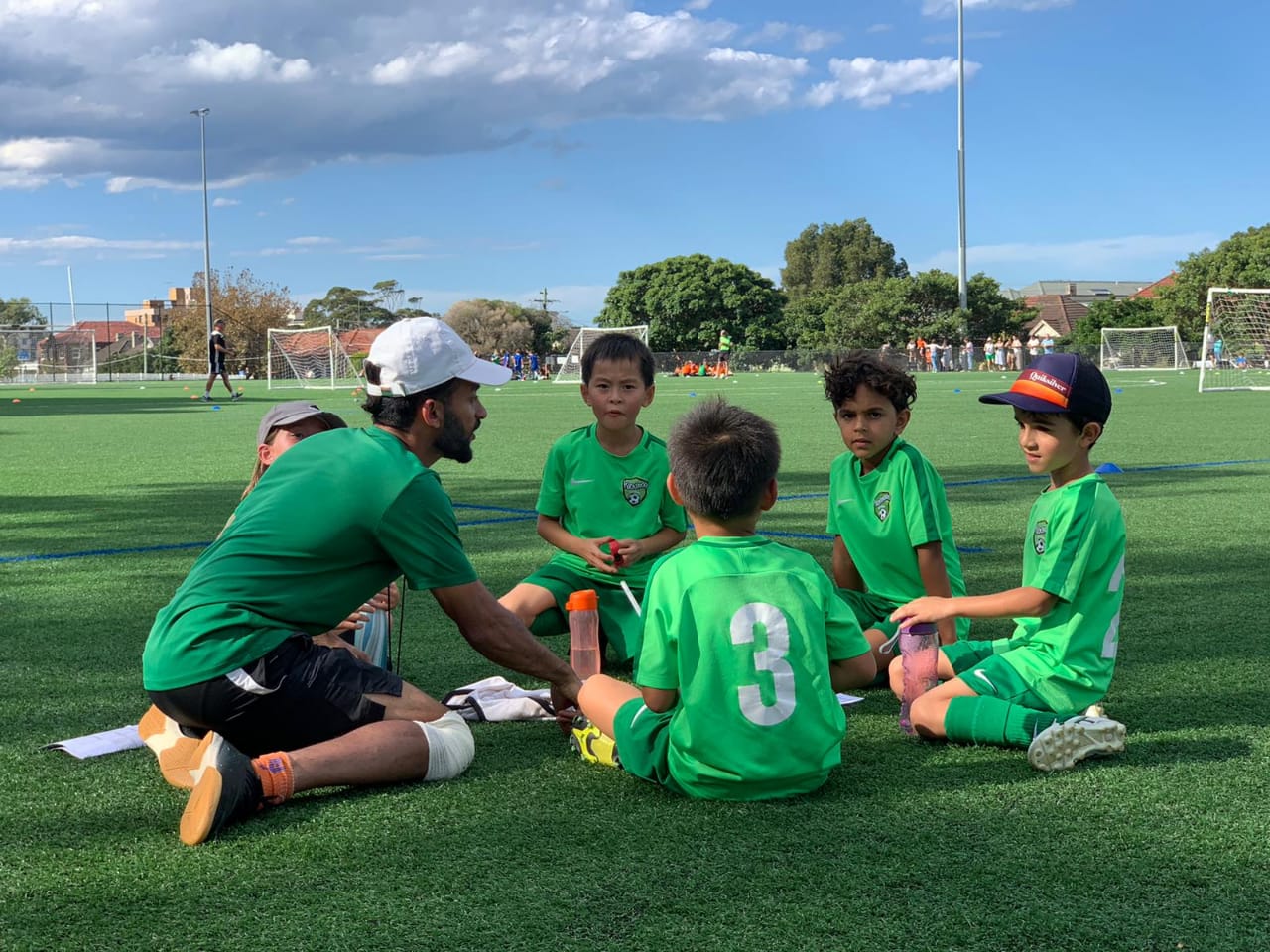 Coach Afser introducing a football training session at Football Concept Academy